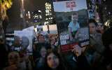 People attend a 24-hour rally for the hostages taken on October 7, marking 100 days since the start of the war between Israel and Hamas, at 'Hostages Square' in Tel Aviv, on January 14, 2024. (Miriam Alster/Flash90)
