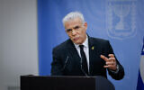 Head of opposition and head of the Yesh Atid party MK Yair Lapid leads a faction meeting at the Knesset, in Jerusalem, on January 15, 2024. (Chaim Goldberg/ Flash90)