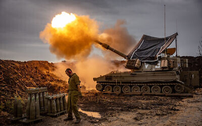 Illustrative: Israeli artillery unit firing shells towards Lebanon near the Israeli border with Lebanon, January 15, 2024. (Yonatan Sindel/Flash90)