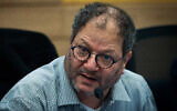 MK Ofer Cassif at the Knesset, in Jerusalem, on January 17, 2024. (Yonatan Sindel/ Flash90)