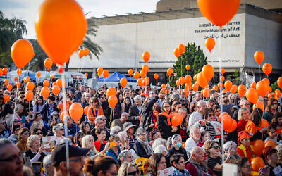Israelis mark the first birthday of Kfir Bibas, who is held hostage by Hamas terrorists in the Gaza Strip, at Hostages Square in Tel Aviv, January 18, 2024. (Miriam Alster/Flash90)