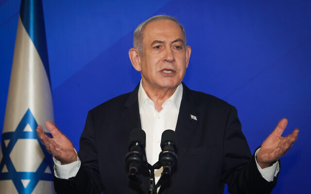 Israeli Prime Minister Benjamin Netanyahu speaks during a press conference at the Defense Ministry, in Tel Aviv on January 18, 2024. (Yariv Katz/POOL)