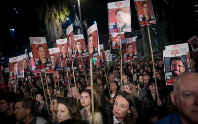 Israelis attend a rally calling for the release of hostages held in Gaza by Palestinian terrorists, at Hostages Square in Tel Aviv, January 20, 2024. (Miriam Alster/Flash90) Israelis attend a rally calling for the release of hostages held in Gaza by Palestinian terrorists, at Hostages Square in Tel Aviv, January 20, 2024. (Miriam Alster/Flash90)