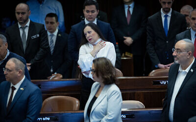 Tally Gotliv (center in white blouse) and other MKs attend a plenum session marking the Knesset's 75th birthday, on January 24, 2024. (Yonatan Sindel/Flash90)