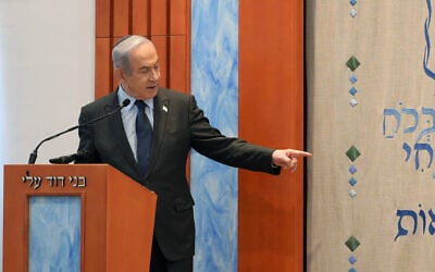 Prime Minister Benjamin Netanyahu speaks at the Bnei David military academy in the West Bank settlement of Eli, January 30, 2023. (Amos Ben Gershom/GPO)