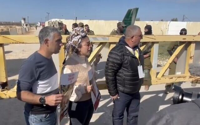 Protesters block the Kerem Shalom border crossing to prevent humanitarian aid trucks from entering the Gaza Strip. At center is Tsufit Libman, whose brother-in-law Elyakim Libman is a hostage, and at right is Danny Elgarat, whose brother Itzik Elgarat is a hostage. (Screen capture/ X. Used in accordance with Clause 27a of the Copyright Law) Protesters block the Kerem Shalom border crossing to prevent humanitarian aid trucks from entering the Gaza Strip. At center is Tsufit Libman, whose brother-in-law Elyakim Libman is a hostage, and at right is Danny Elgarat, whose brother Itzik Elgarat is a hostage. (Screen capture/ X. Used in accordance with Clause 27a of the Copyright Law)