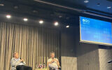 Palantir CEO Alex Karp (right) in a conversation with tech guru Yossi Vardi at Tel Aviv University, January 9, 2024. (Sharon Wrobel/The Times of Israel)