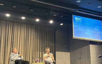 Palantir CEO Alex Karp (right) in a conversation with tech guru Yossi Vardi at Tel Aviv University, January 9, 2024. (Sharon Wrobel/The Times of Israel)