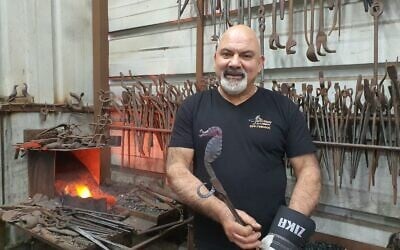 Walied Khury in his blacksmith studio in Fassuta. (Duha Khoury)