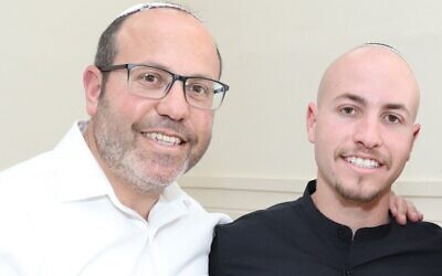 Tzvika Mor in an undated photo with his son Eitan, who is being held captive by Hamas in Gaza. (Courtesy)