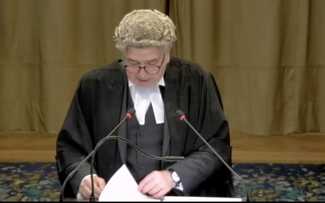 Dr Christopher Staker speaks in defense of Israel during the second day of hearings at the World Court, January 12, 2024. (Youtube screenshot)
