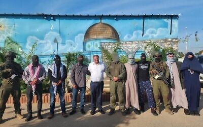 National Security Minister Itamar Ben Gvir visits a Border Police base in the West Bank, posing with troops in undercover garb on January 18, 2024. (National Security Ministry)