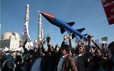 Houthi supporters attend a rally in support of the Palestinians in the Gaza Strip and against the US-led airstrikes on Yemen, in Sanaa, Yemen, January 26, 2024. (AP Photo/Osamah Abdulrahman)