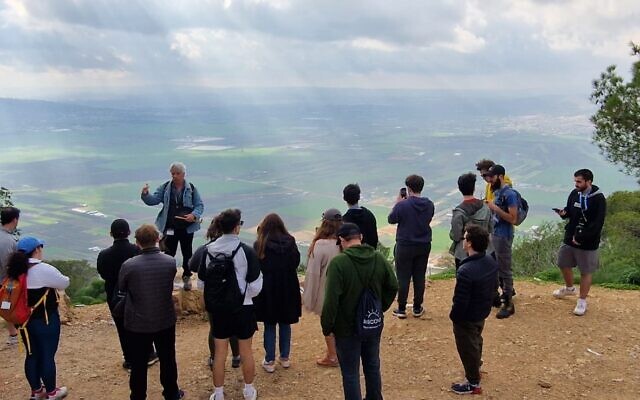 The first Birthright Israel group to visit the country since the massacres of October 7, touring with guide Duby Langberg of Tailor Made on top of Mount Tabor, January 2024. (Photo: Cat Korren)