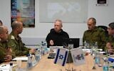 Defense Minister Yoav Gallant at a briefing with commanders in the IDF Judea and Samaria Division on January 14, 2024. (Ariel Hermoni/Defense Ministry)
