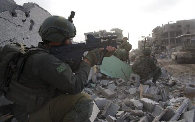 IDF soldiers operating in the Gaza Strip in an undated photo released January 2, 2024. (Israel Defense Forces) IDF soldiers operating in the Gaza Strip in an undated photo released January 2, 2024. (Israel Defense Forces)