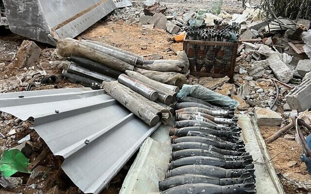 Mortars and rockets found by IDF troops in Gaza's al-Bureij, in a photo released by the IDF on January 2, 2024. (Israel Defense Forces) Mortars and rockets found by IDF troops in Gaza's al-Bureij, in a photo released by the IDF on January 2, 2024. (Israel Defense Forces)