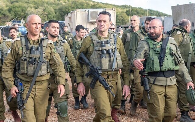 IDF Chief of Staff Lt. Gen. Herzi Halevi (center) tours Israel's northern border, January 3, 2024. (Israel Defense Forces) IDF Chief of Staff Lt. Gen. Herzi Halevi (center) tours Israel's northern border, January 3, 2024. (Israel Defense Forces)