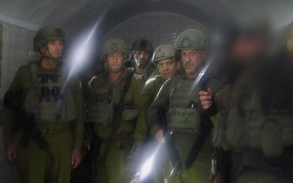 IDF Chief of Staff Lt. Gen. Herzi Halevi (left), head of the Southern Command, Maj. Gen. Yaron Finkelman (second from left), head of the Military Intelligence Directorate, Maj. Gen. Aharon Haliva (second from right), and head of the Shin Bet security agency Ronen Bar (right) tour a Hamas tunnel in Khan Younis, January 5, 2024. (Israel Defense Forces)