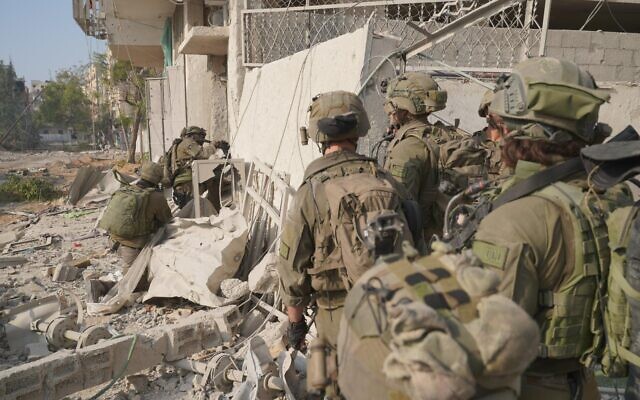IDF troops operate inside the Gaza Strip in a handout photo released for publication on January 7, 2024. (Israel Defense Forces) IDF troops operate inside the Gaza Strip in a handout photo released for publication on January 7, 2024. (Israel Defense Forces)