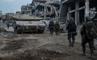 IDF troops operate in Gaza in a handout image published January 8, 2024. (Israel Defense Forces)