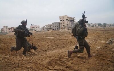 IDF troops operate in Gaza in a handout image cleared for publication on January 9, 2024. (Israel Defense Forces)