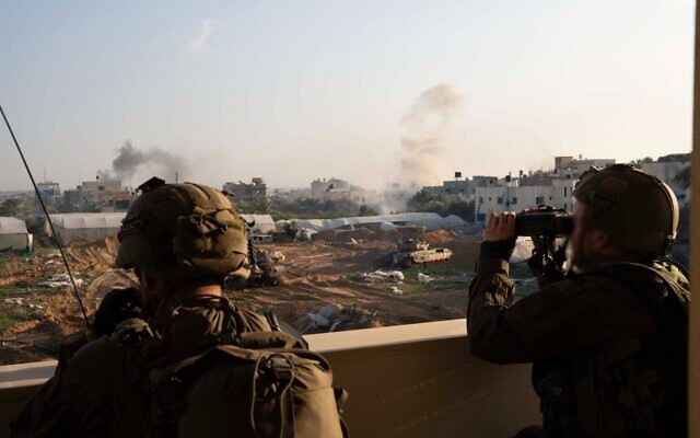 IDF troops of the 5th Reserve Brigade operate in southern Gaza’s Khuza'a, in this undated photo published by the military on January 10, 2024. (Israel Defense Forces)