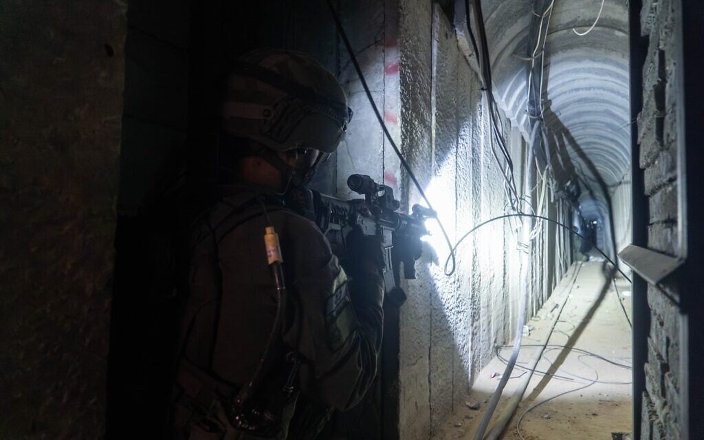 Israeli troops operate inside a Hamas tunnel in the Khan Younis area, in an image released by the IDF on January 23, 2024. (Israel Defense Forces)
