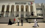 Illustrative: Pedestrians walk past Dubai's courts building in 2010 in the United Arab Emirates. (AFP)