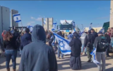 Israelis demonstrate at a protest action at Kerem Shalom border crossing on January 24, 2024. (Courtesy: Reut Ben Haim)