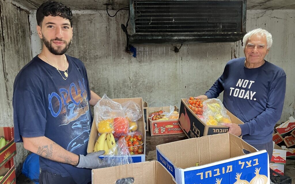 Volunteers at a farm in the agricultural collective town of Liman, December 2023. (Diana Bletter)
