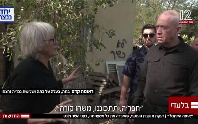 Reuma Kedem, a bereaved mother and grandmother who lost her daughter, son-in-law, and three young grandkids on October 7, confronts Defense Minister Yoav Gallant, January 10, 2024. (Channel 12, screenshot)