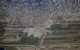Buildings razed in Gaza City's Shejaiya neighborhood, as part of the army's efforts to establish a buffer zone on the border with the Gaza Strip, in an image provided by the IDF on January 10, 2024. The Israel-Gaza border runs across the bottom of the picture. (Israel Defense Forces)