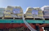 One of the humanitarian aid shipments awaiting entry into Gaza following an Israeli security check on January 10, 2024 at the Kerem Shalom border crossing. (Charlie Summers/Times of Israel)