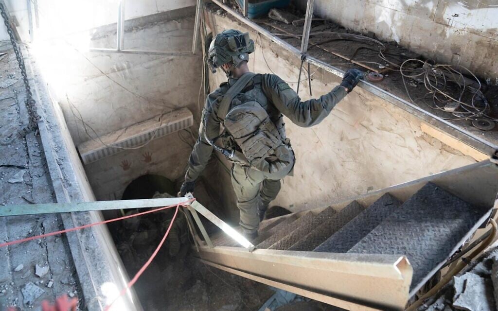 Troops operate inside a Hamas tunnel in the Khan Younis area, in this image released by the IDF on January 23, 2024. (Israel Defense Forces)