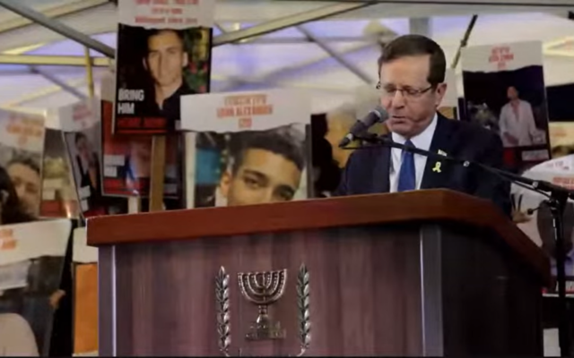 President Isaac Herzog addresses the 100-day rally in Tel Aviv's 'Hostages Square' on January 14, 2024. (Screenshot)