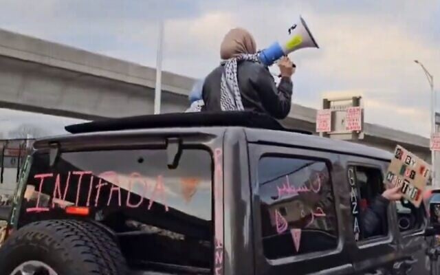 A car bearing the word 'intifada' seen as part of a convoy of vehicles seeking to disrupt operations at JFK airport to protest against Israel, January 1, 2024. (Screenshot/Twitter, Used in accordance with Clause 27a of the Copyright Law) A car bearing the word 'intifada' seen as part of a convoy of vehicles seeking to disrupt operations at JFK airport to protest against Israel, January 1, 2024. (Screenshot/Twitter, Used in accordance with Clause 27a of the Copyright Law)