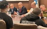 Prime Minister Benjamin Netanyahu in a meeting with relatives of hostages held in Gaza, at the Prime Minister's Office in Jerusalem on January 22, 2024. (Prime Minister's Office)