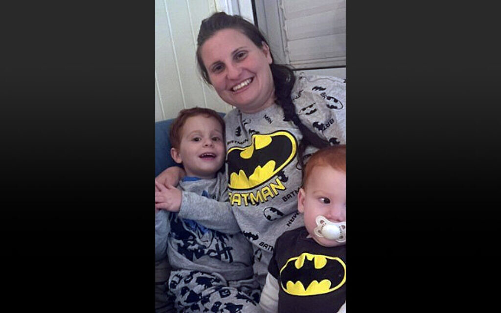 Shiri Bibas (center) and her sons Ariel, 4, (left) and baby Kfir, who were abducted from Kibbutz Nir Oz by Hamas terrorists on October 7, 2023 (Courtesy)