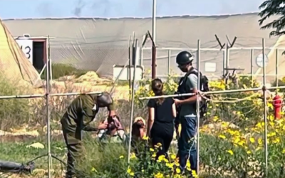 Nasreen Youssef filmed talking to Hamas terrorists near the yard of her home on Moshav Yated, close to the southern Gaza border, October 7, 2023. (Screenshot taken from Channel 12/Keshet TV, used in accordance with Clause 27a of the Copyright Law).
