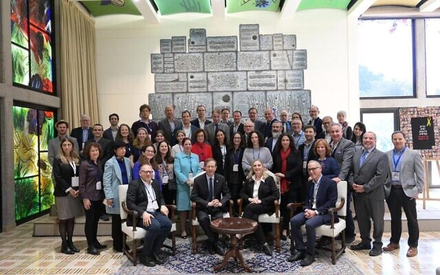 A University of Pennsylvania faculty delegation with President Isaac Herzog, center, on December 2, 2024. (Amos Ben-Gershom/GPO)