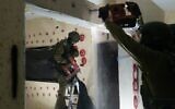 IDF troops prepare to demolish the home of a Hamas terrorist in the West Bank village of Urif, early January 24, 2024. (Israel Defense Forces)