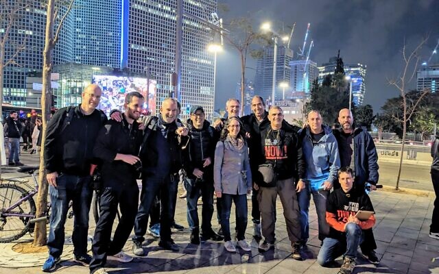 Photographers from the Israel Democracy Photography and Drone Squadron including Yair Palti, 3rd from right, and Amir Goldstein, 4th from right. (Ronen Berman)