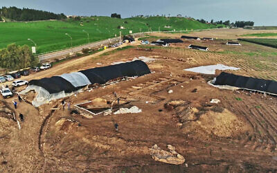 Excavating a former Roman Legion base, at the foot of Tel Megiddo, in an undated photo. (Emil Aladjem, Israel Antiquities Authority)