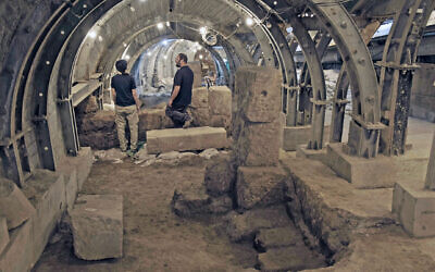 Archaeologists Ari Levy and Rikki Zalut Har-Tuv of the Israel Antiquities Authority at the Pilgrimage Road excavations, in an undated photo. (Emil Aladjem/Israel Antiquities Authority)