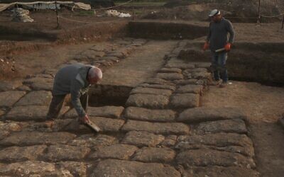 Excavating a former Roman Legion base, at the foot of Tel Megiddo, in an undated photo. (Emil Aladjem, Israel Antiquities Authority)