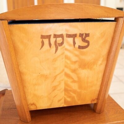 A tzedakah box for charitable giving in the foyer of a synagogue in Lafayette, California, Jan. 20, 2022. (Smith Collection/Gado/Getty Images) A tzedakah box for charitable giving in the foyer of a synagogue in Lafayette, California, Jan. 20, 2022. (Smith Collection/Gado/Getty Images)