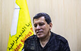 Mazloum Abdi, who heads the Kurdish-led, US-backed Syrian Democratic Forces (SDF), speaks during an interview with AFP on October 10, 2023 in Syria's northern city of Hasakeh. (Delil Souleiman/AFP)