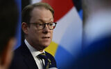 Sweden's Foreign Minister Tobias Billstrom addresses journalists upon arrival for an EU Ministerial Conference at the Federal Foreign Office in Berlin on November 2, 2023. (John MACDOUGALL / AFP)