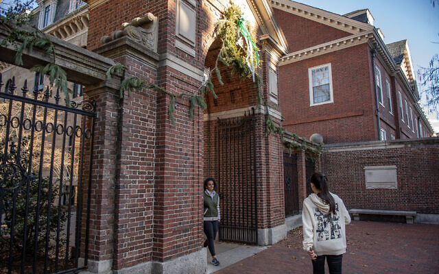 File: People enter and exit Harvard Yard at a gate at Harvard University in Cambridge, Massachusetts on December 12, 2023. (Joseph Prezioso/AFP) File: People enter and exit Harvard Yard at a gate at Harvard University in Cambridge, Massachusetts on December 12, 2023. (Joseph Prezioso/AFP)